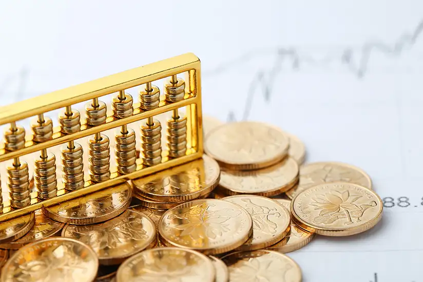 golden abacus with gold coins
